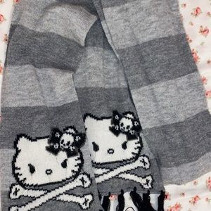 Both hello kitty scarf and backpack